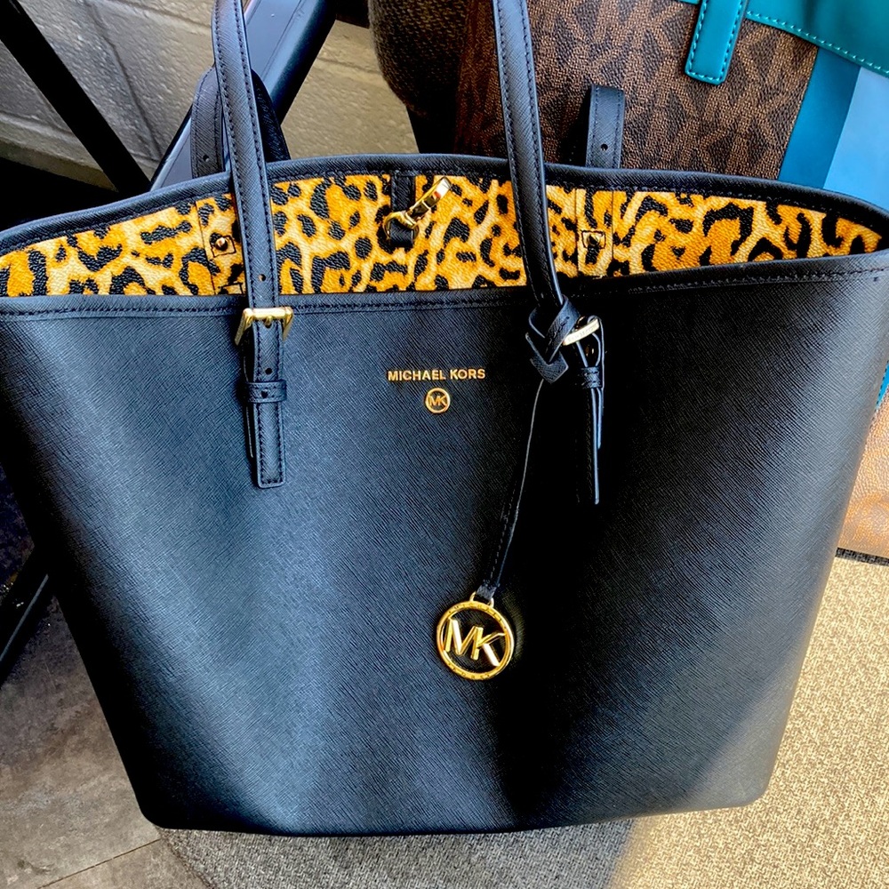 Genuine Michael Kors leather purse, brand new. Zero wear and tear